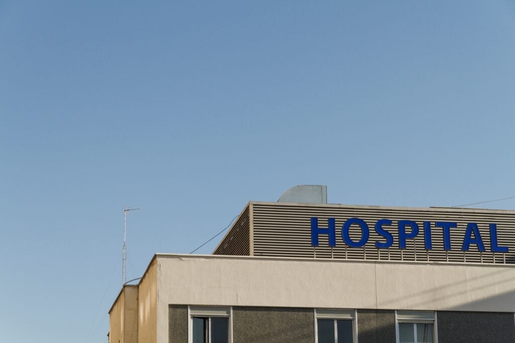 Cropped image of the top of the hospital building in the concept of 'top services and amenities in Greenwich'.
